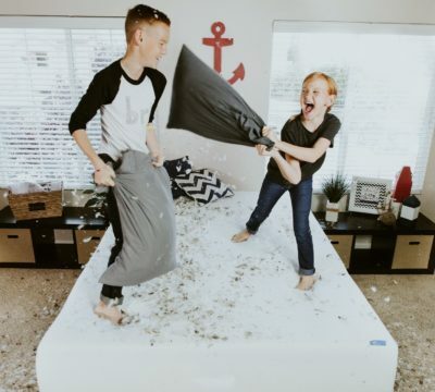 a man and a woman holding a kite