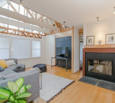 a living room with a fireplace