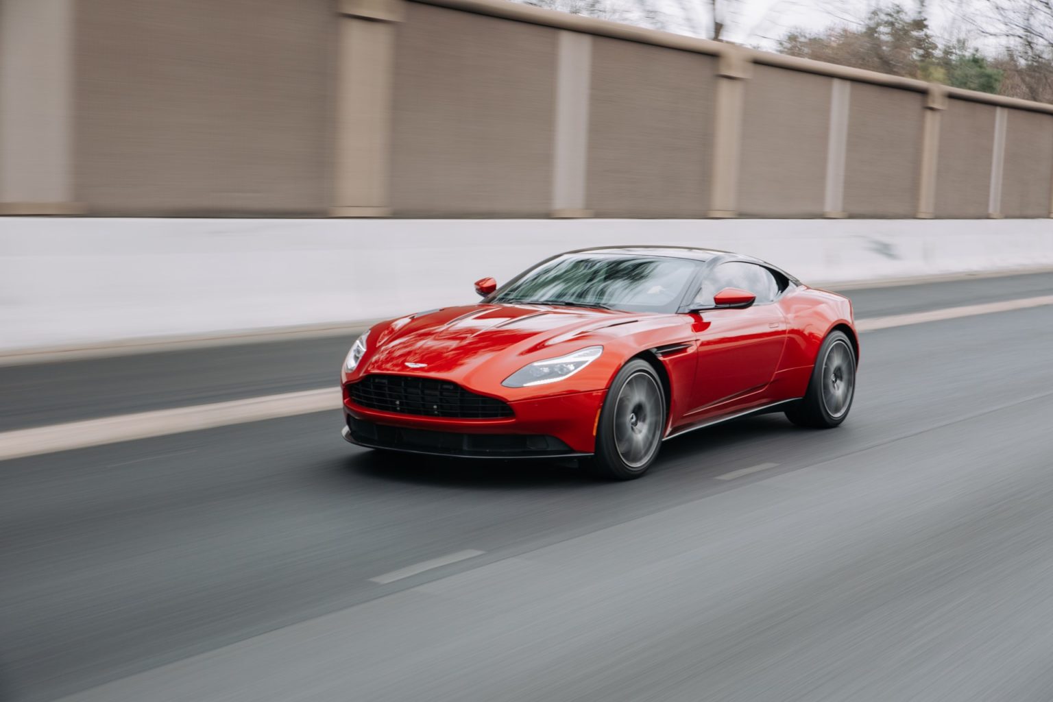 a red sports car on a road