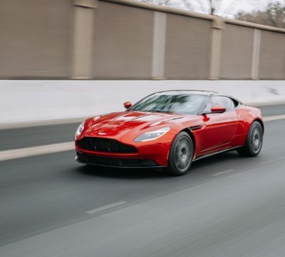 a red sports car on a road