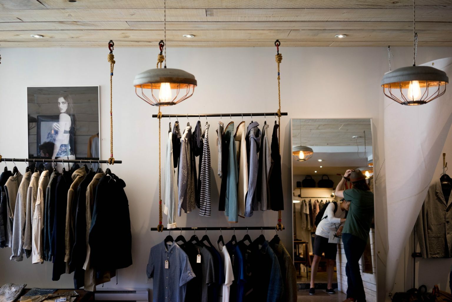 a store with clothes from the ceiling