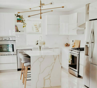 a kitchen with white cabinets