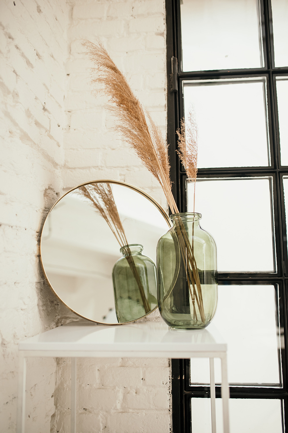 a couple of glasses on a shelf